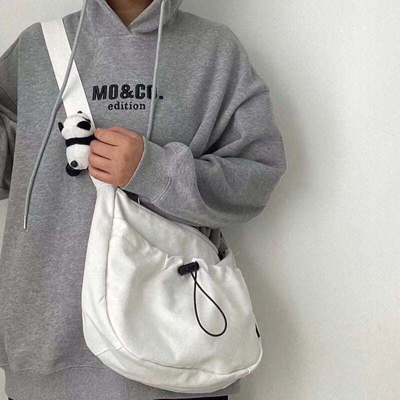 White canvas crossbody on sale bag