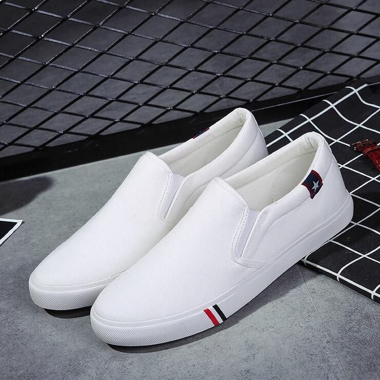white canvas slipons