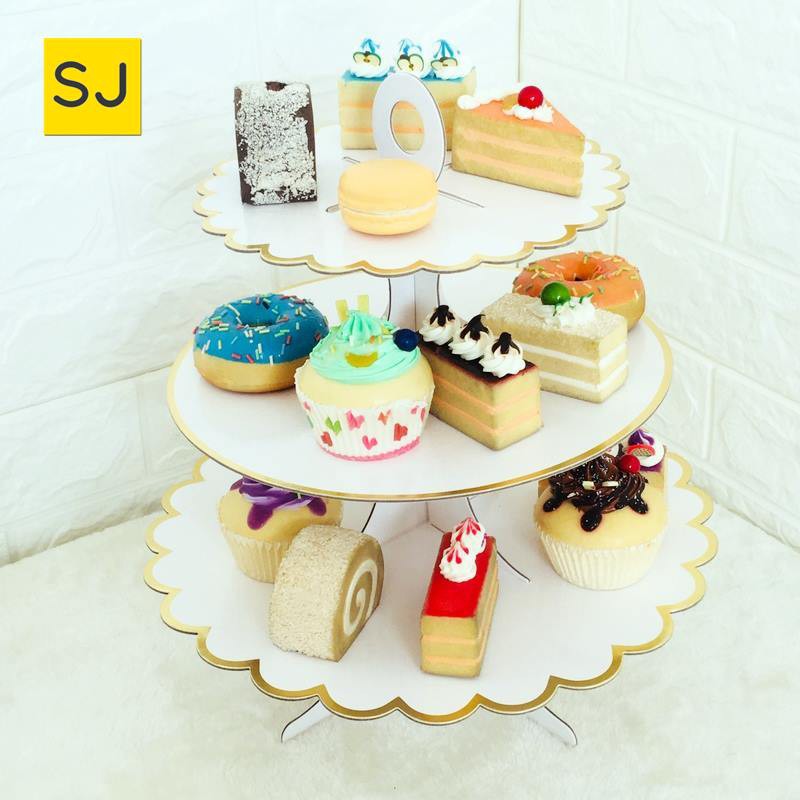 Disposable cake clearance stand