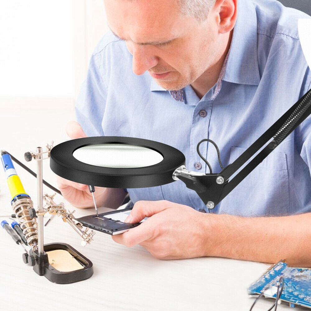 Work lamp deals with magnifying glass