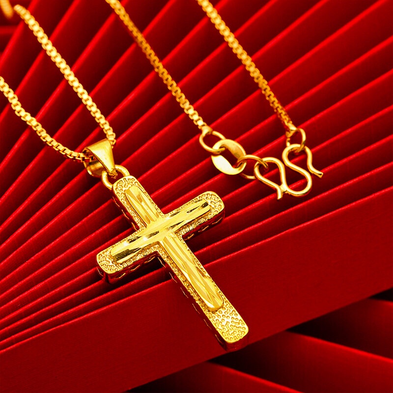 Gold necklace store with cross pendant