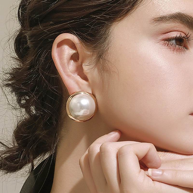 Double pearl stud on sale earrings