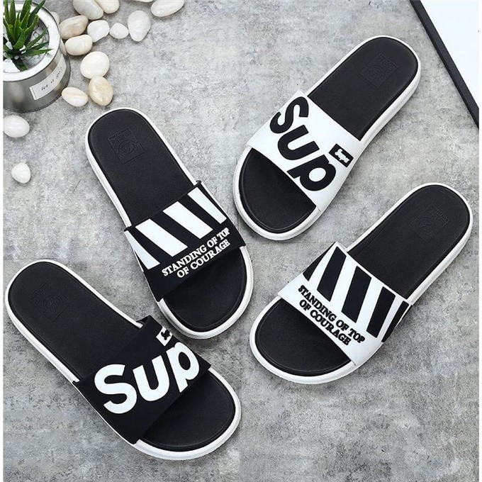 Supreme store slippers black